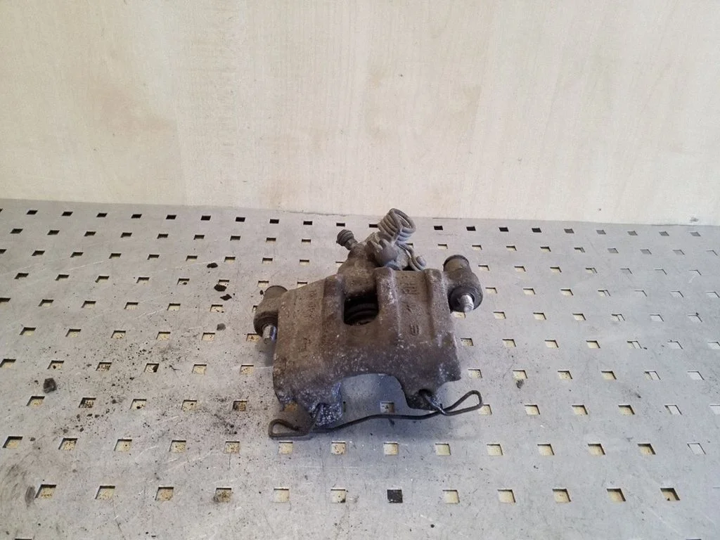 Rear brake caliper – right