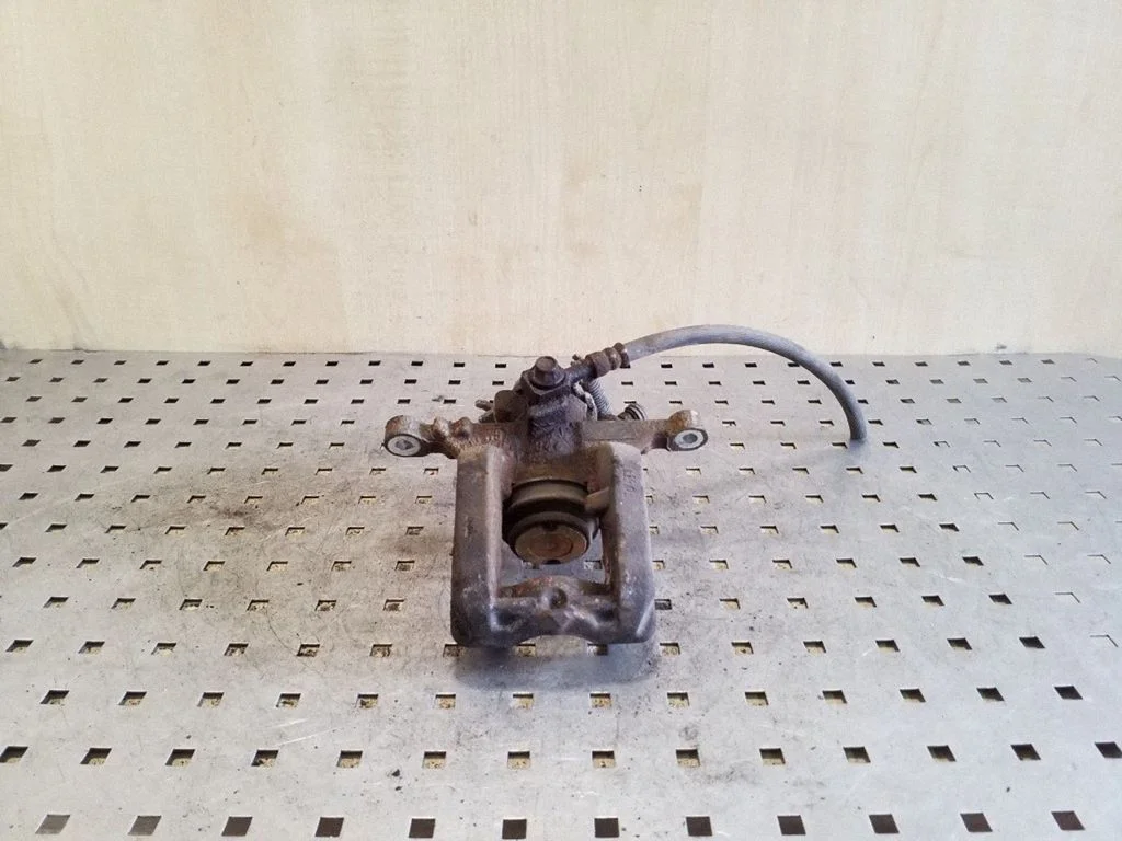 Rear brake caliper – right