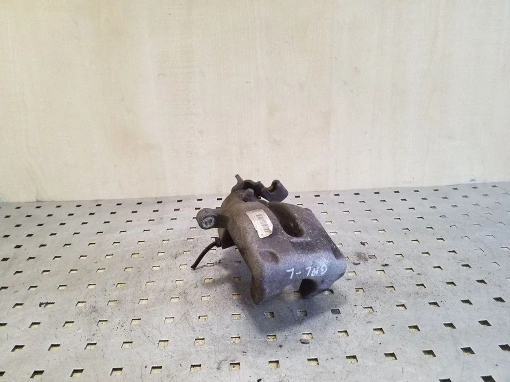 Rear brake caliper – left