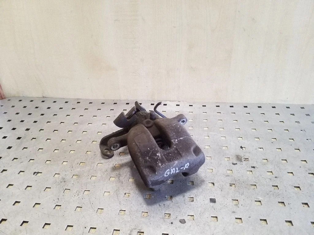 Rear brake caliper – right