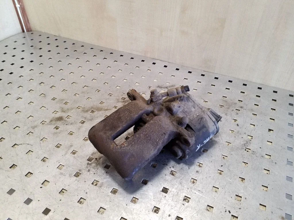 Rear brake caliper – right