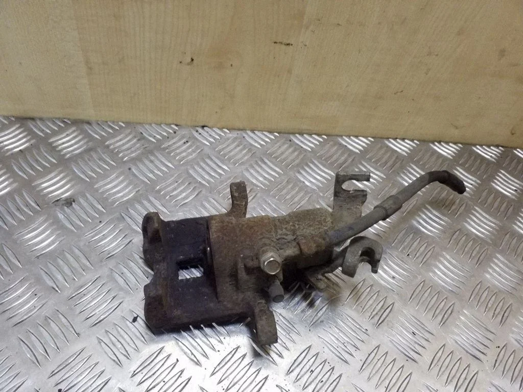 Rear brake caliper – right