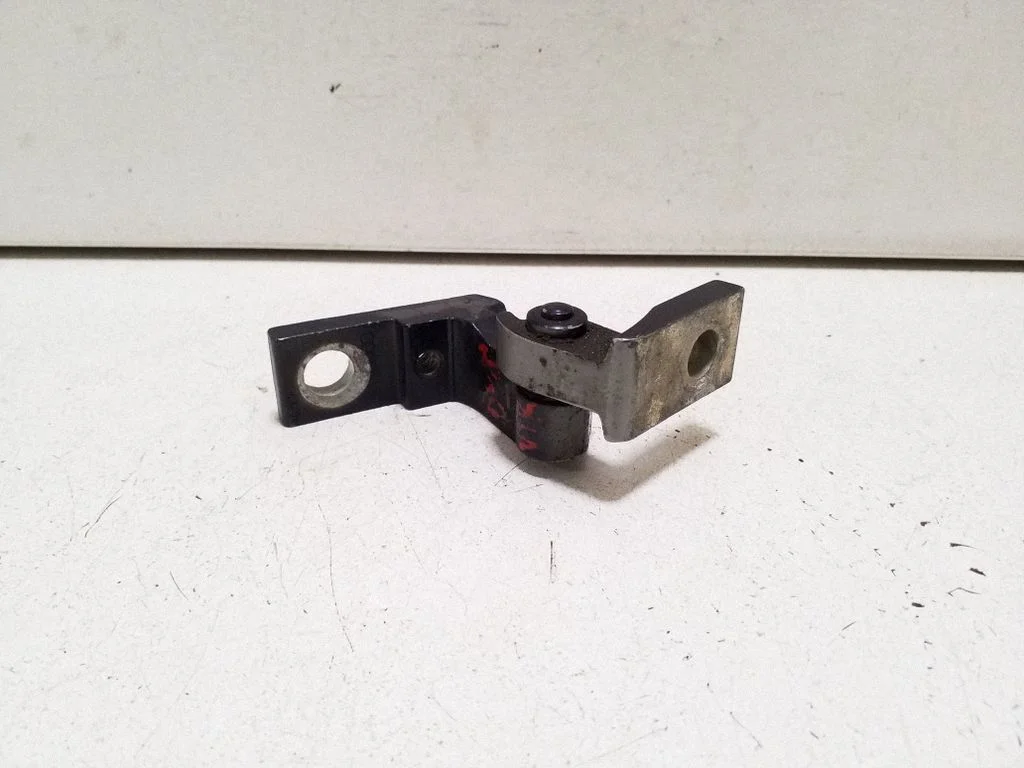 Front door upper hinge – left