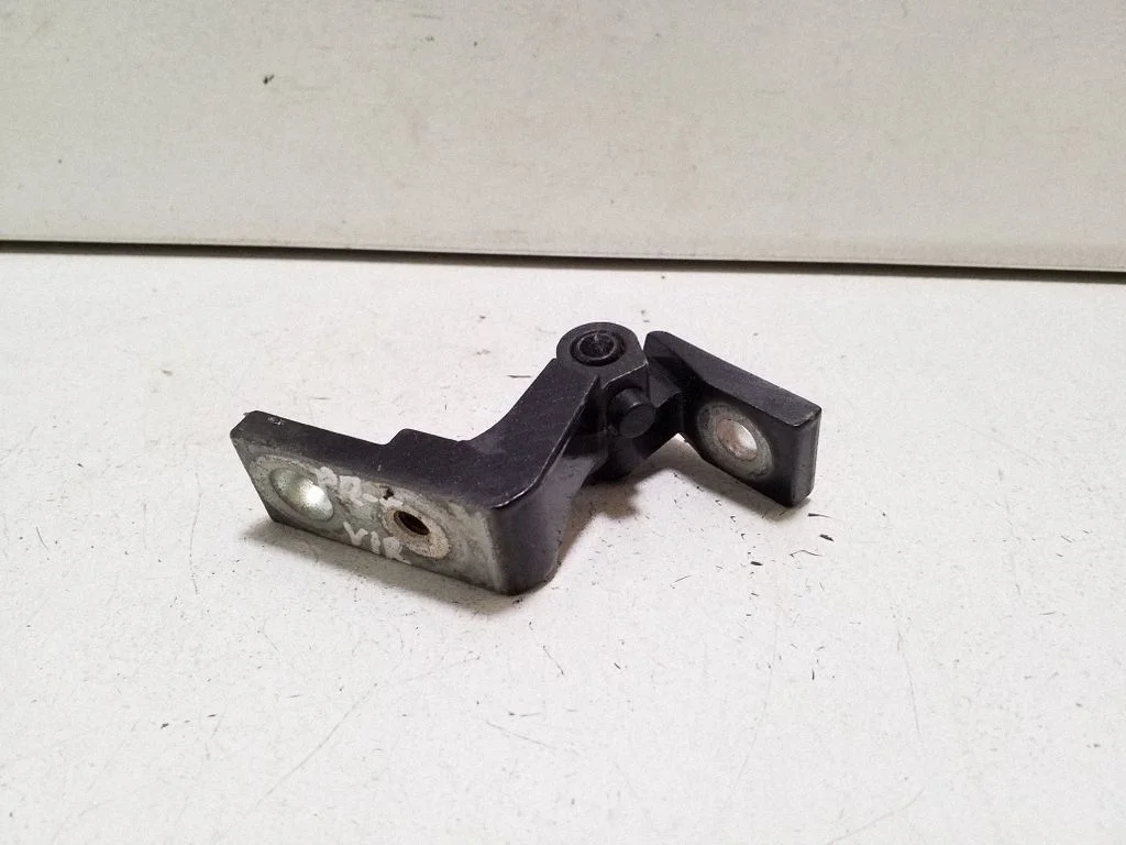 Front door upper hinge – left
