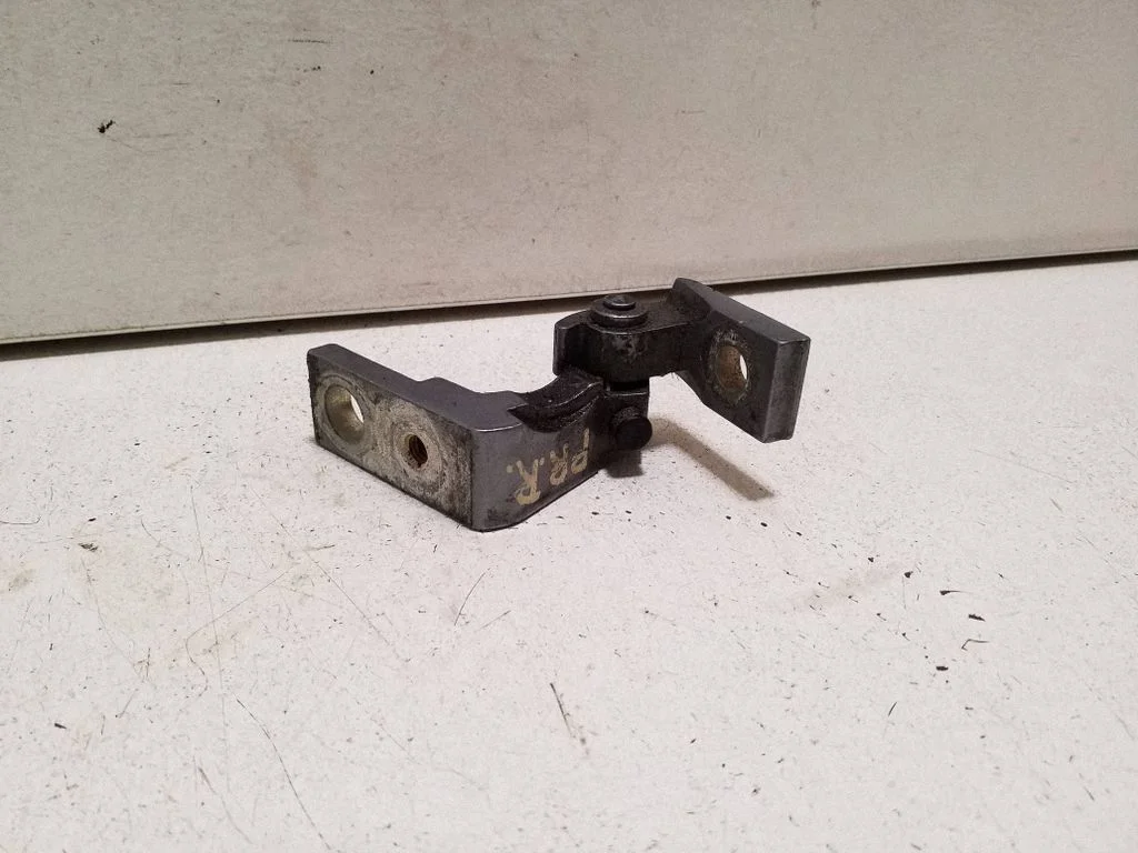 Front door upper hinge – right