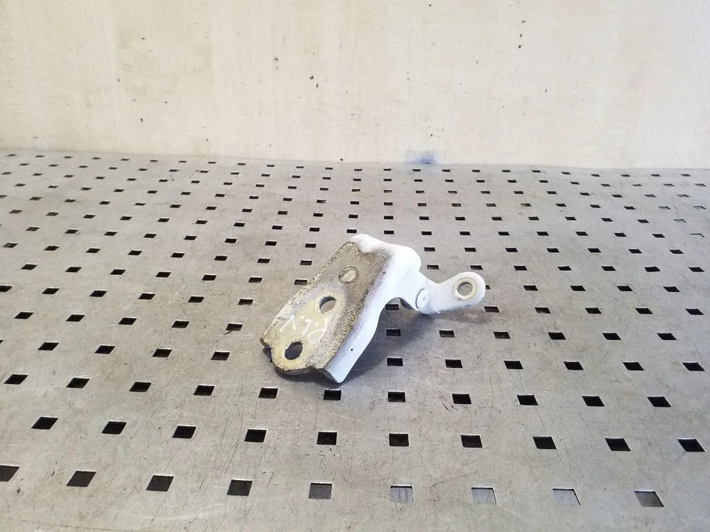 Front door upper hinge – left