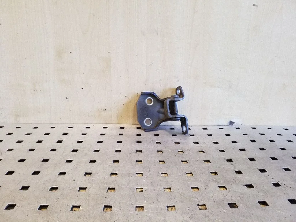 Front door upper hinge – front left