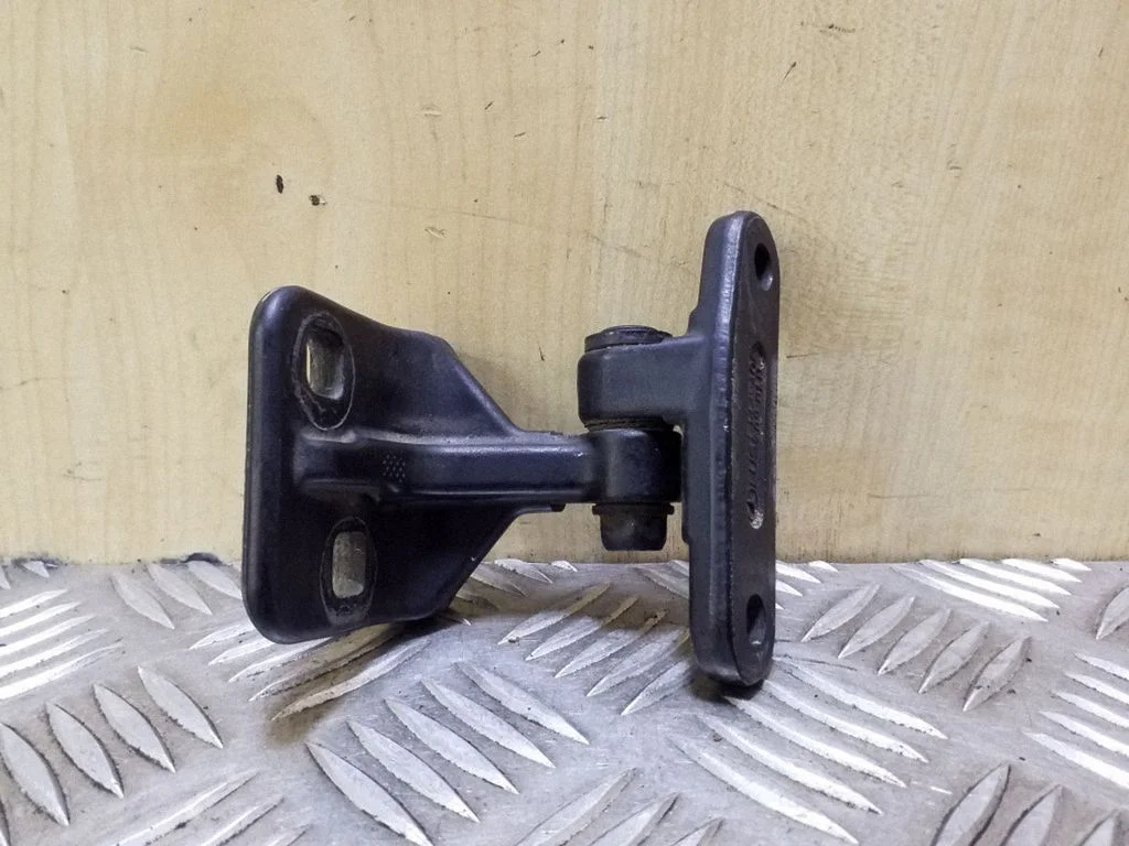 Front door upper hinge – left