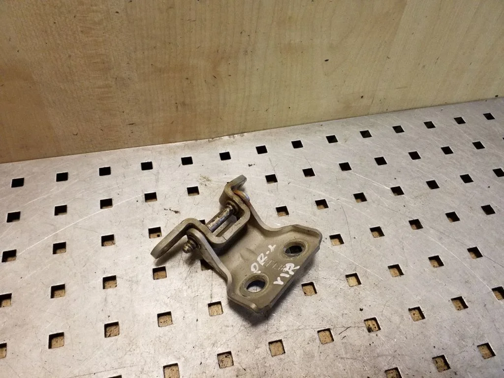 Front door upper hinge – left