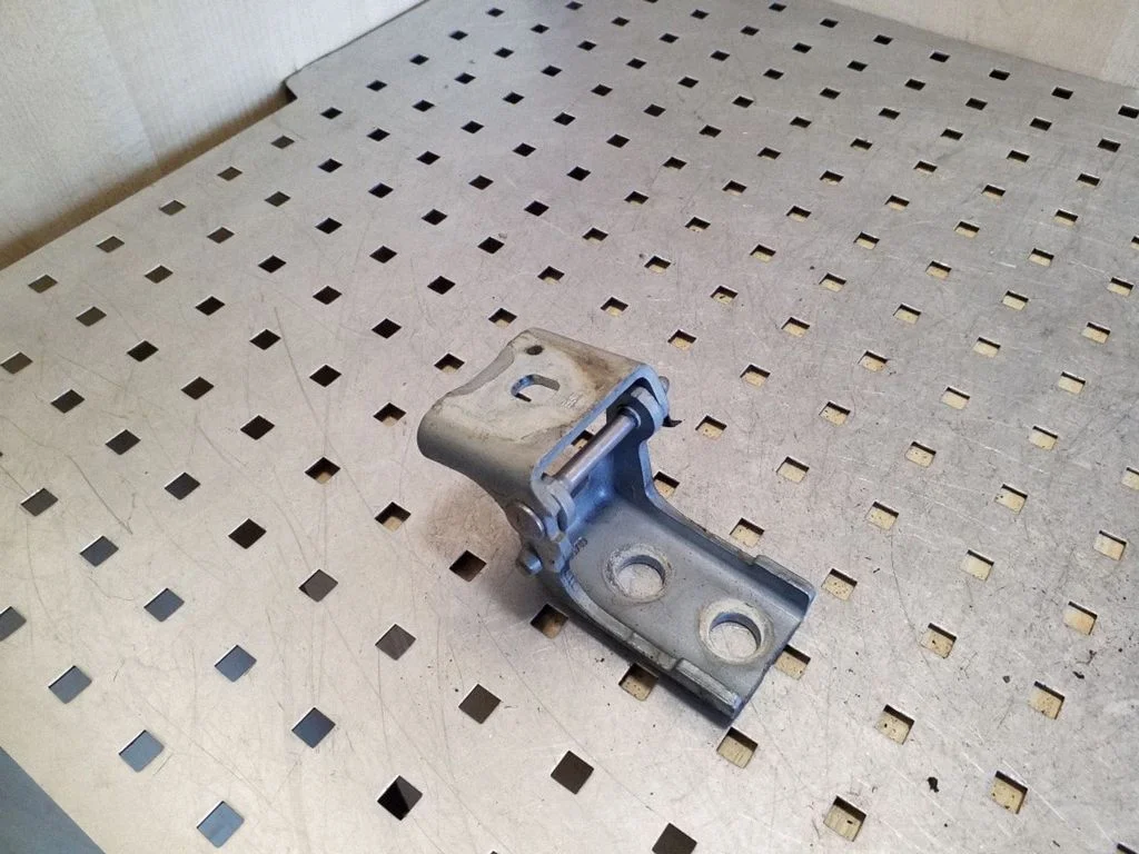 Front door upper hinge – right