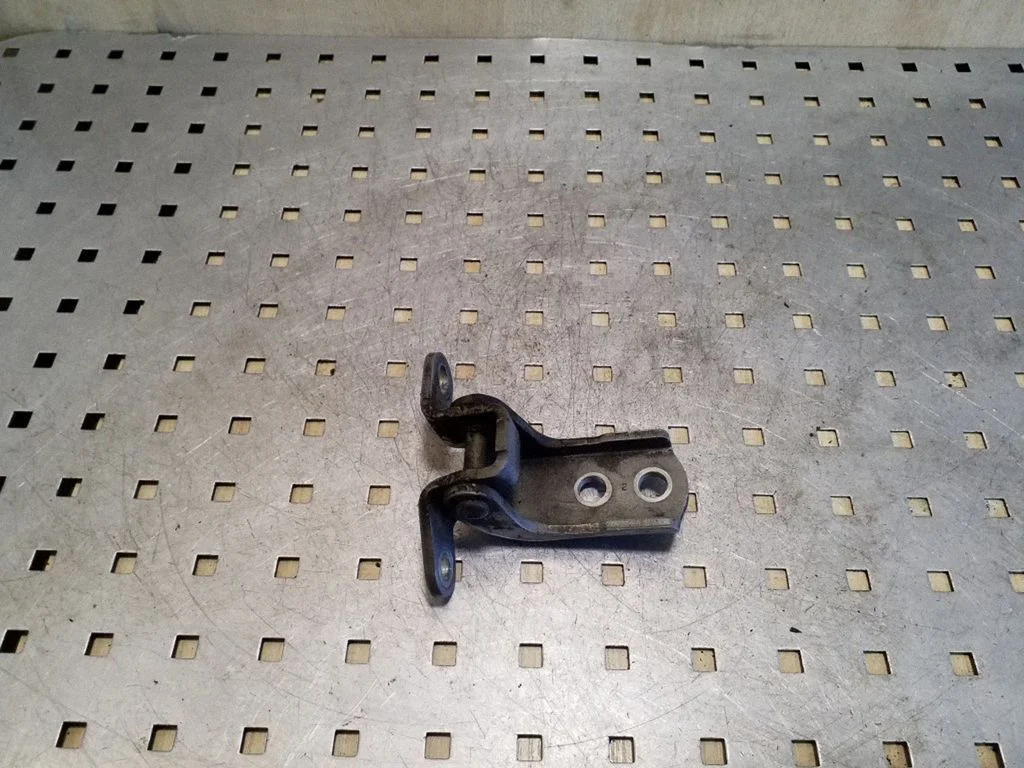 Front door upper hinge – left