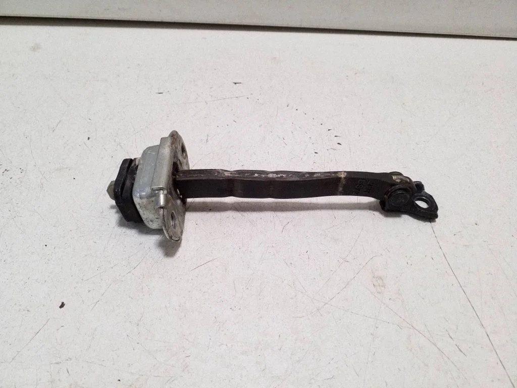 Front door check strap stopper – right