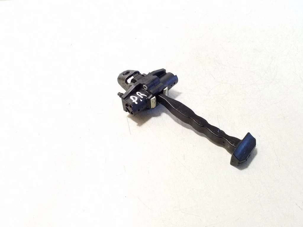 Front door check strap stopper – right