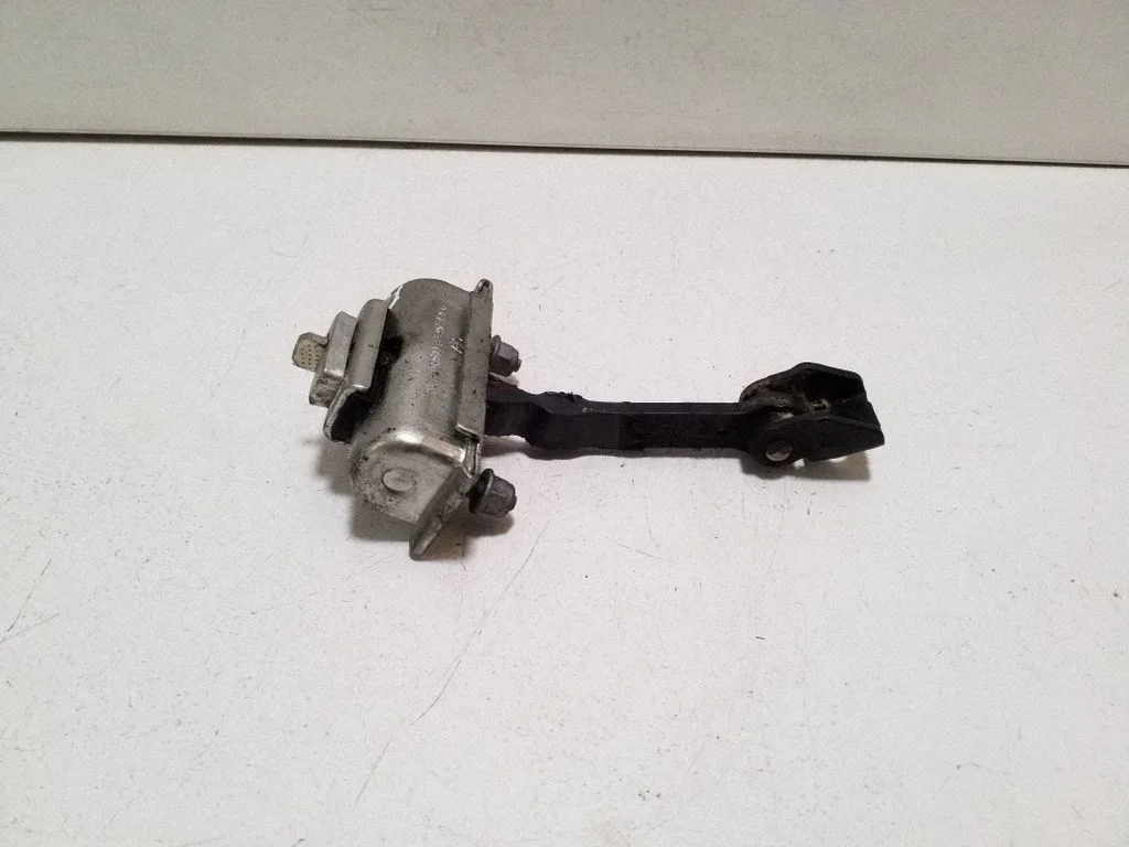 Front door check strap stopper BK21V23500AF