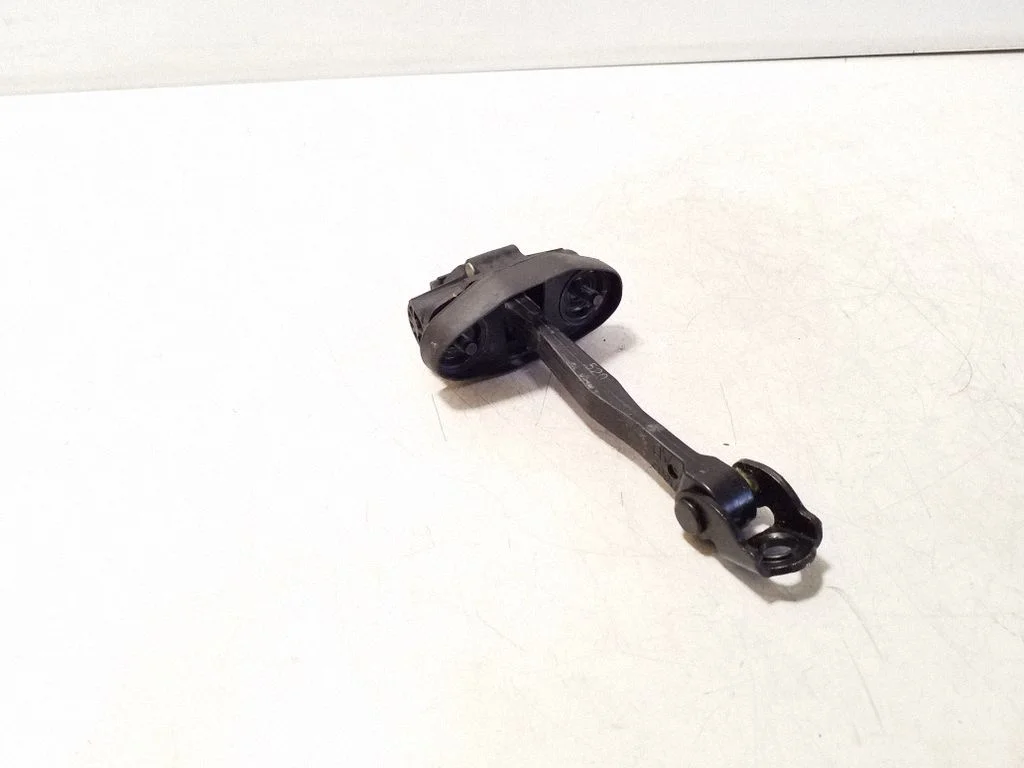Front door check strap stopper – right