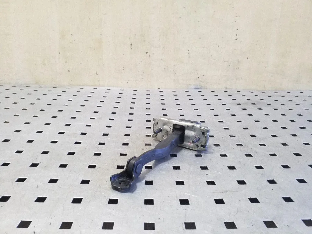 Front door check strap stopper – Ford Mondeo MK V (2014-)
