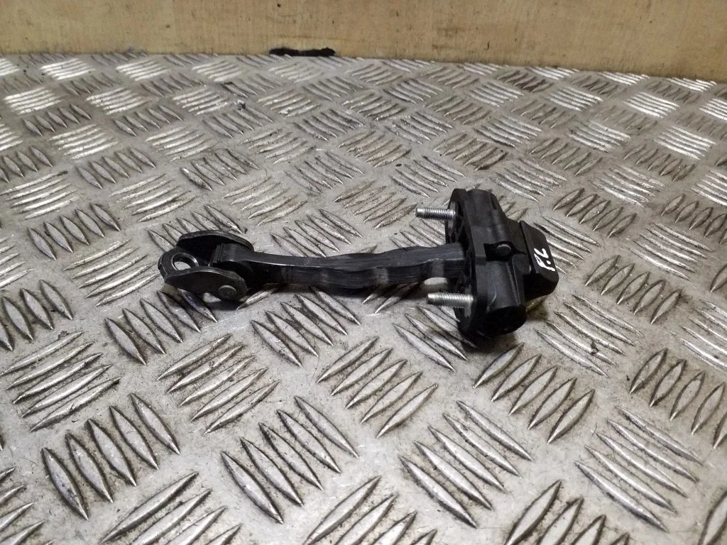 Front door check strap stopper 31299810
