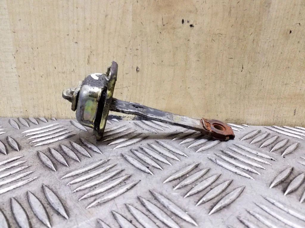 Front door check strap stopper 701837249A
