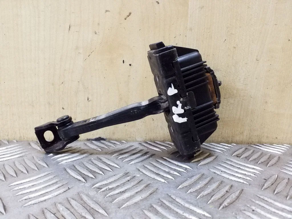 Front door check strap stopper 7176807