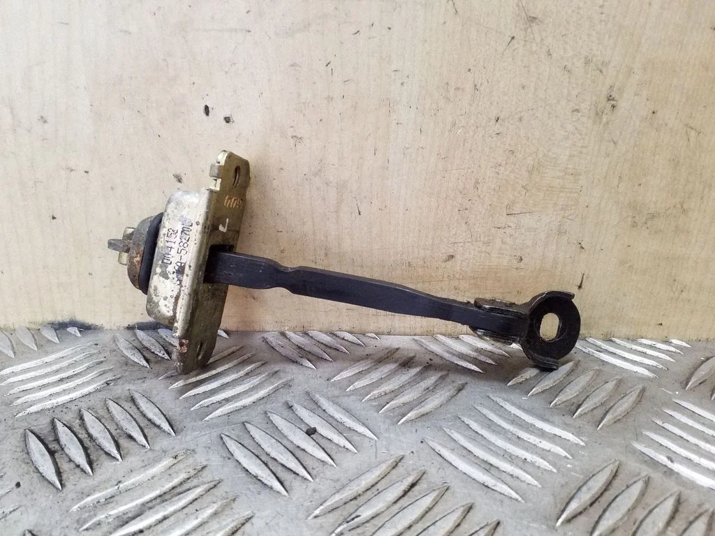 Front door check strap stopper GJ6A58270B
