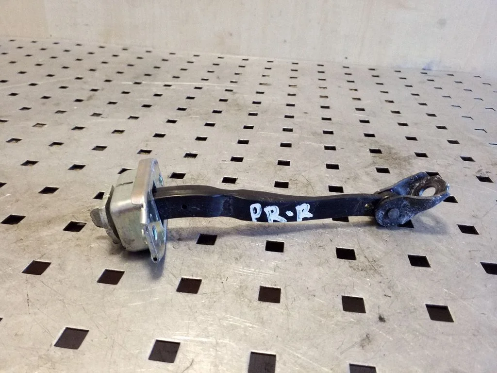 Front door check strap stopper – right