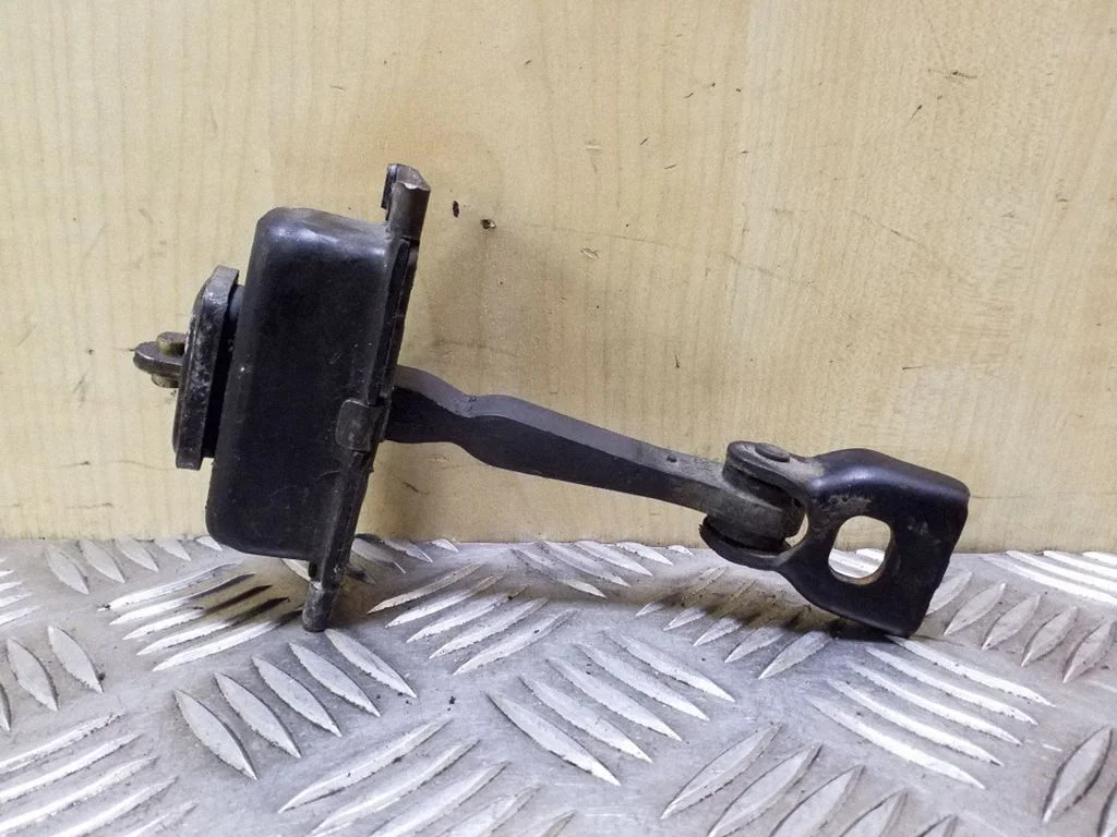 Front door check strap stopper A1687200116