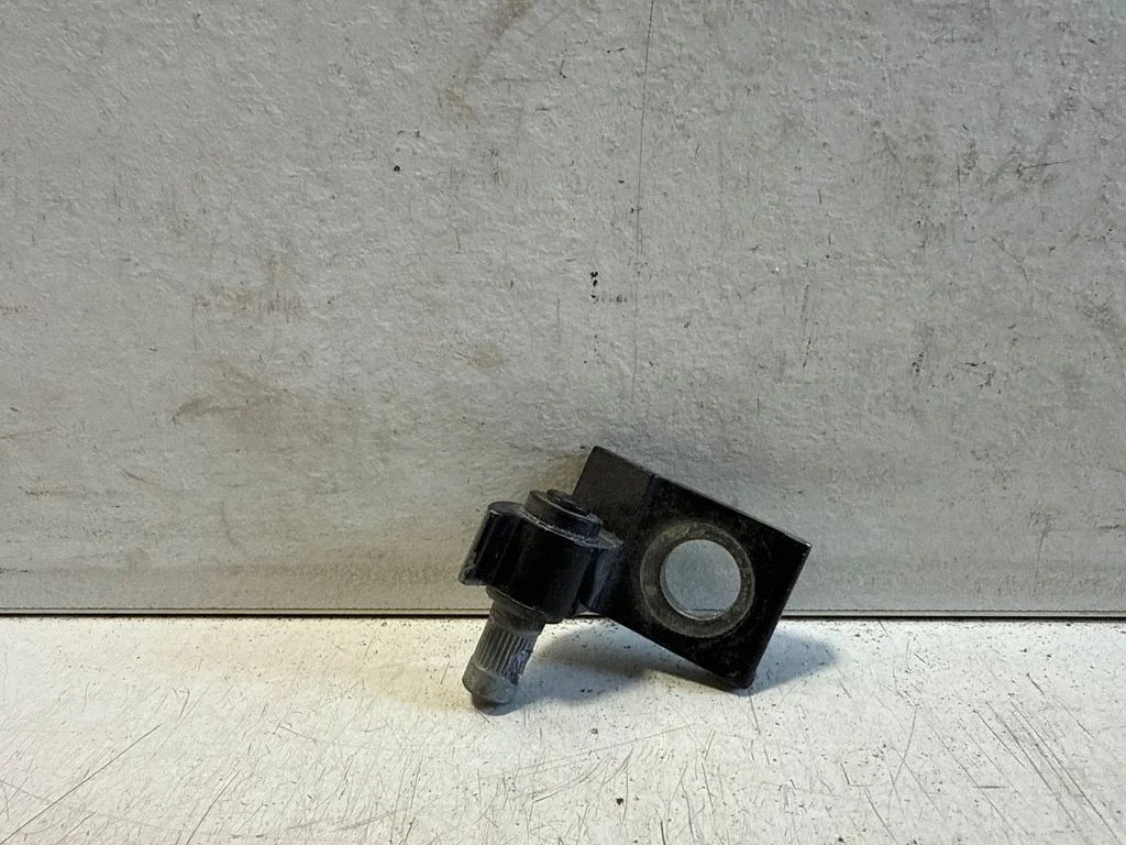Front door lower hinge – right