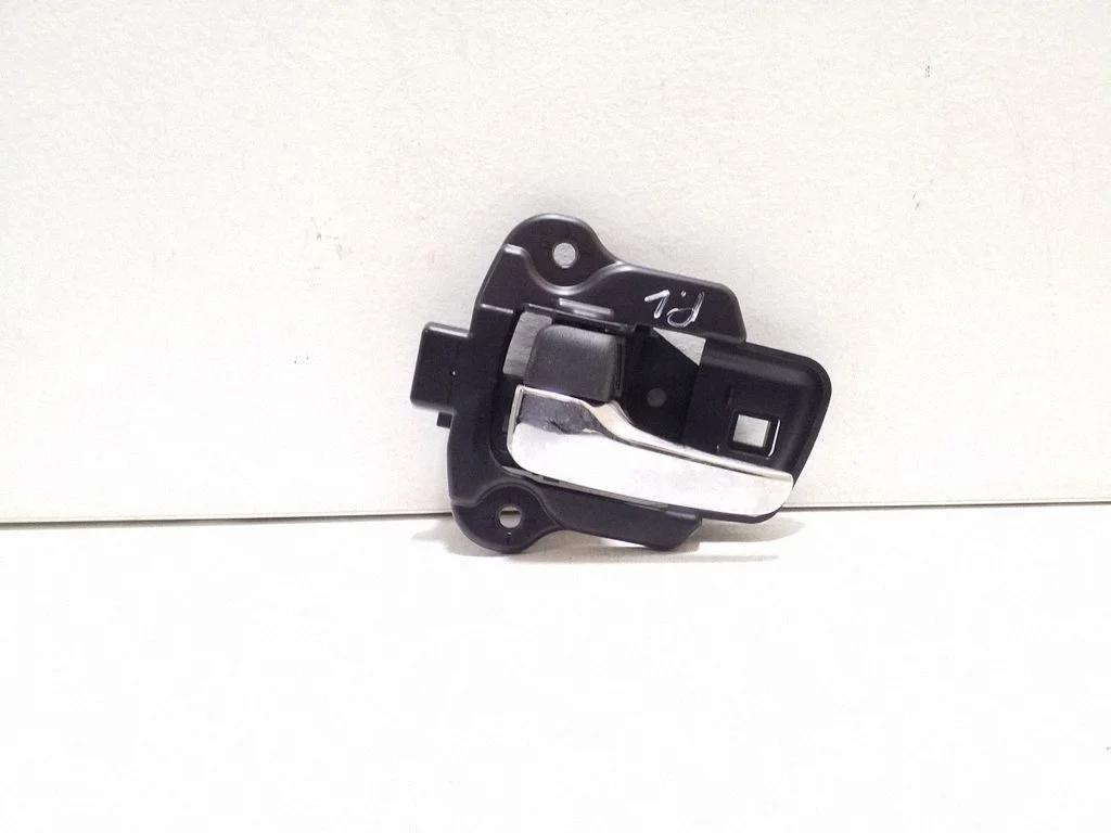 Front door interior handle – left