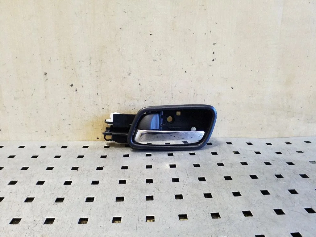 Front door interior handle – left