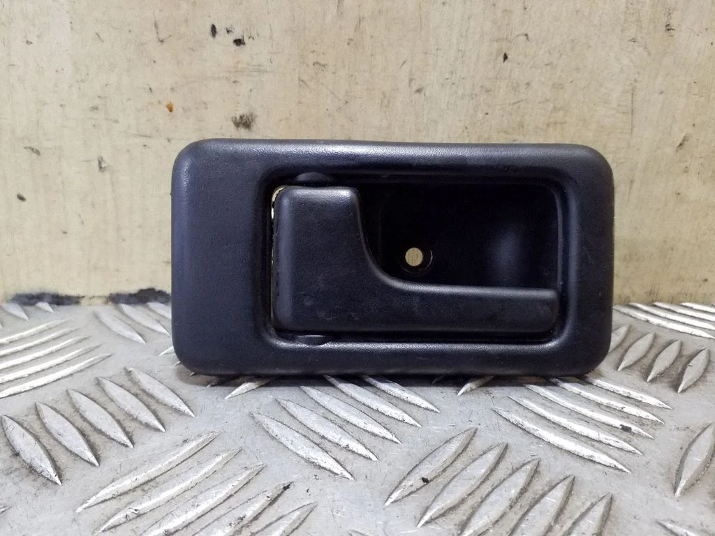 Front door interior handle – left