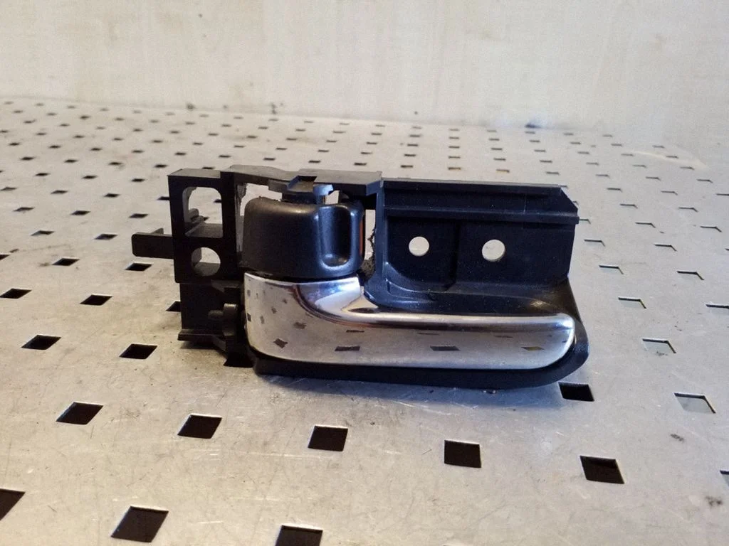 Front door interior handle 50594A1