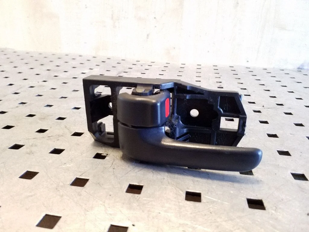 Front door interior handle – left