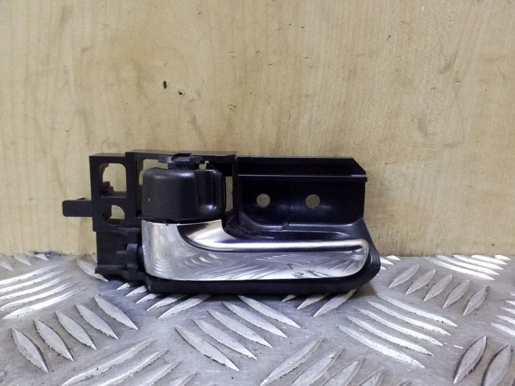 Front door interior handle 50594A1