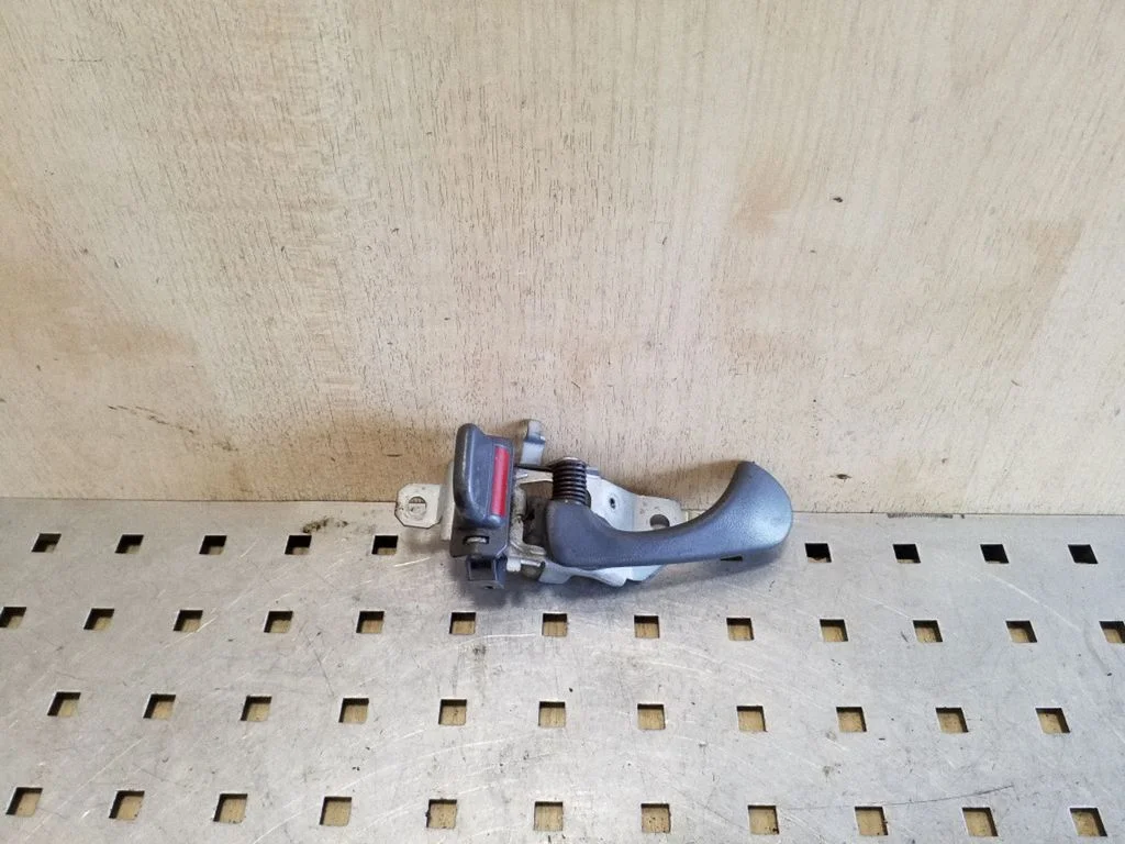 Front door interior handle – left