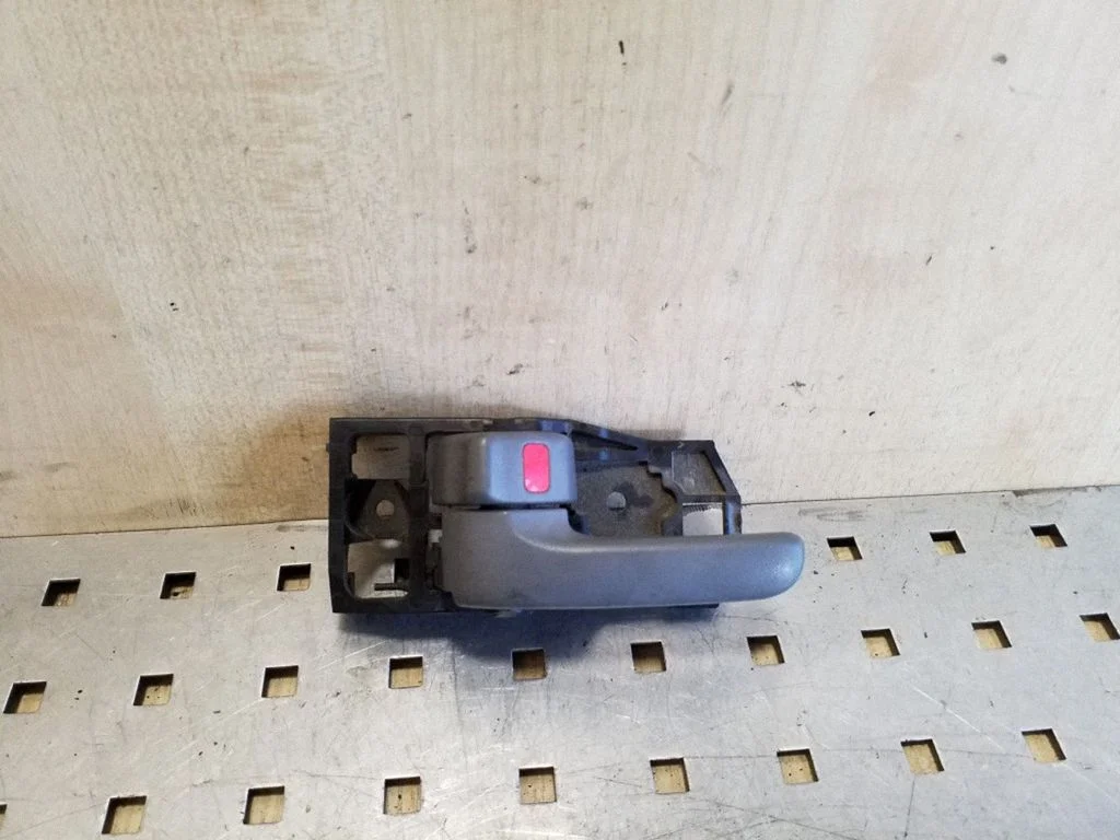 Front door interior handle – left