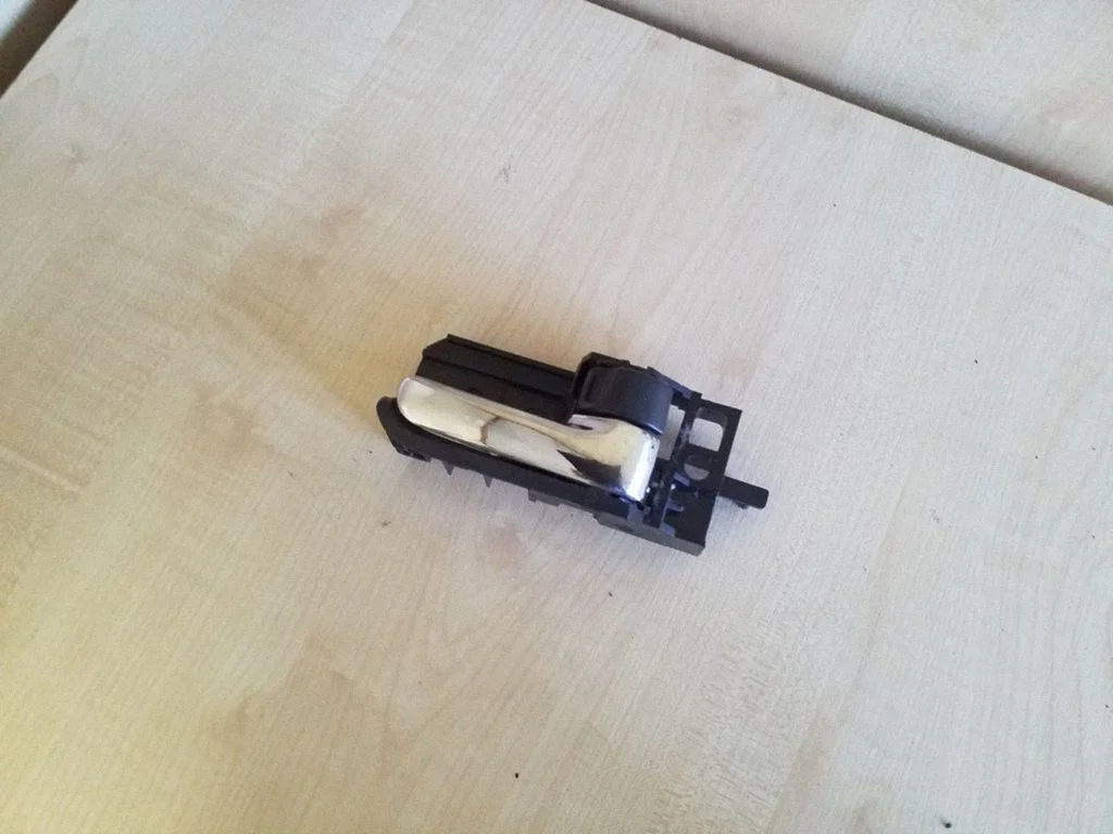 Front door interior handle 50594A1