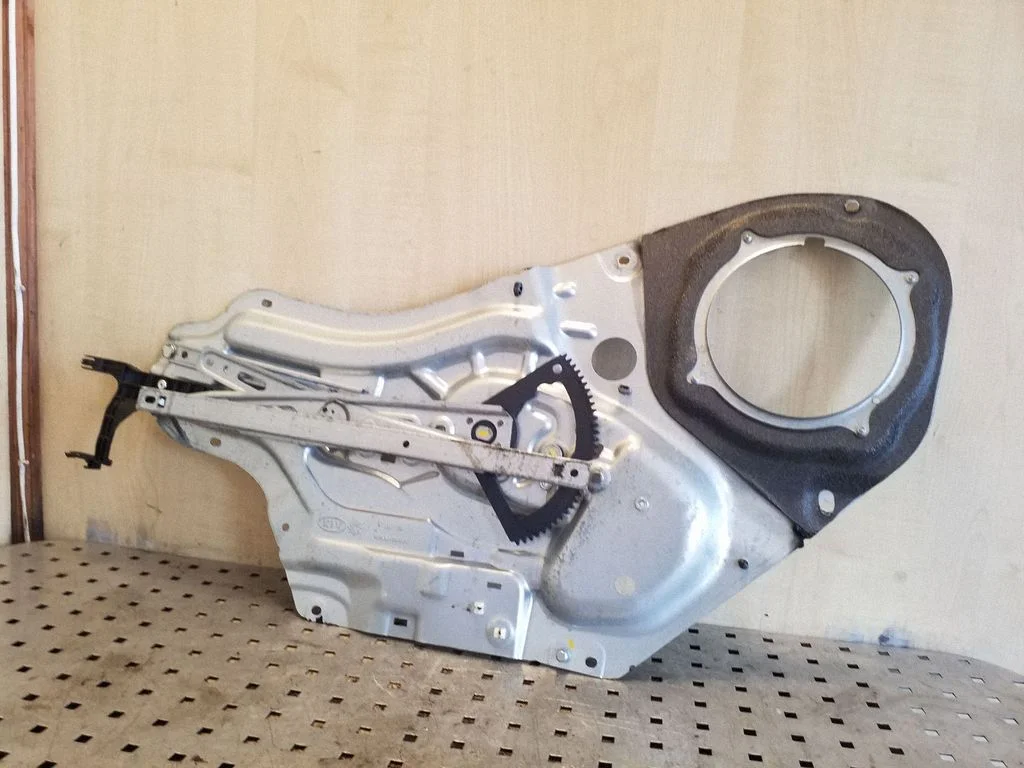 Front window lifting mechanism without motor – left