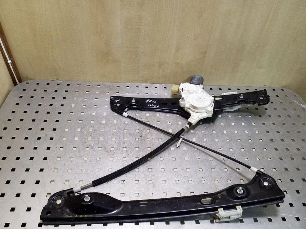 Front door window regulator with motor 6927027