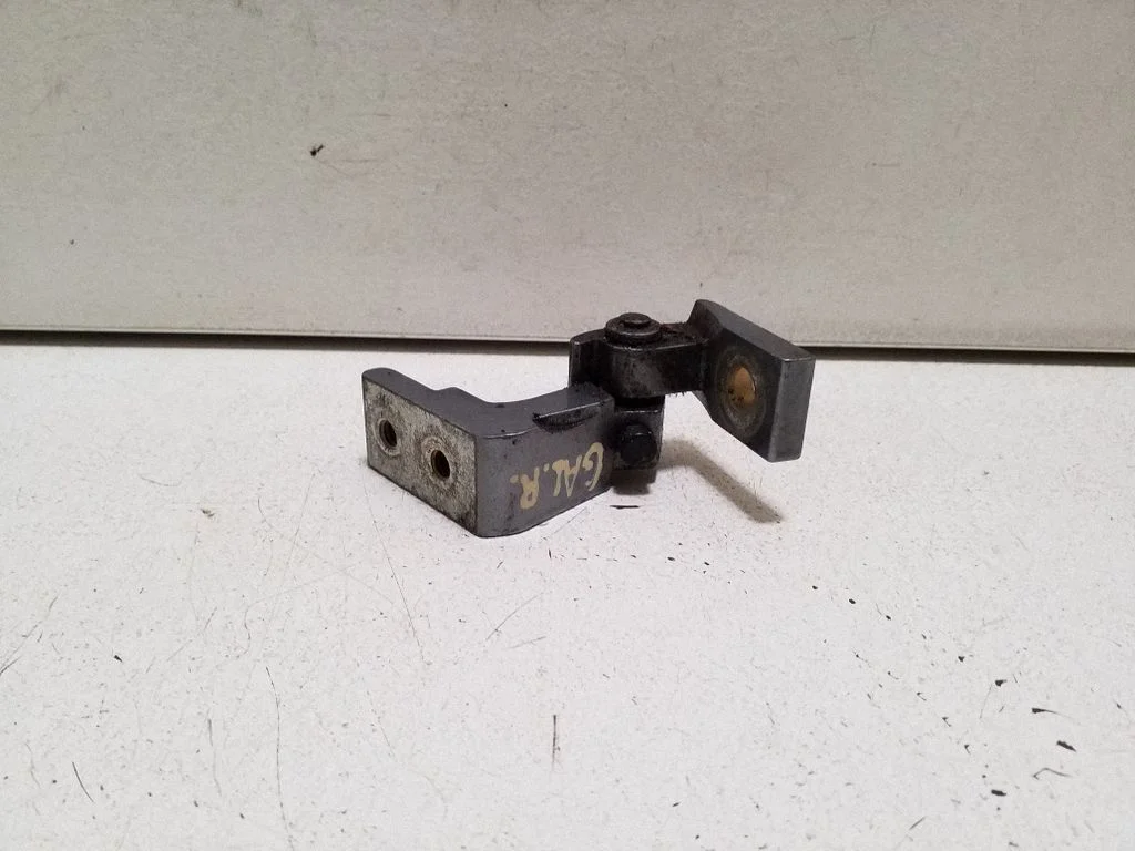 Rear door upper hinge – right