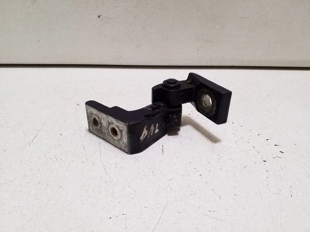 Rear door upper hinge – right