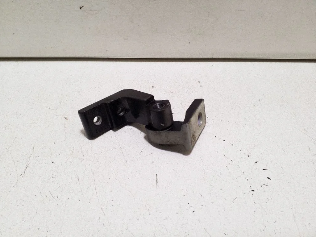 Rear door upper hinge – right