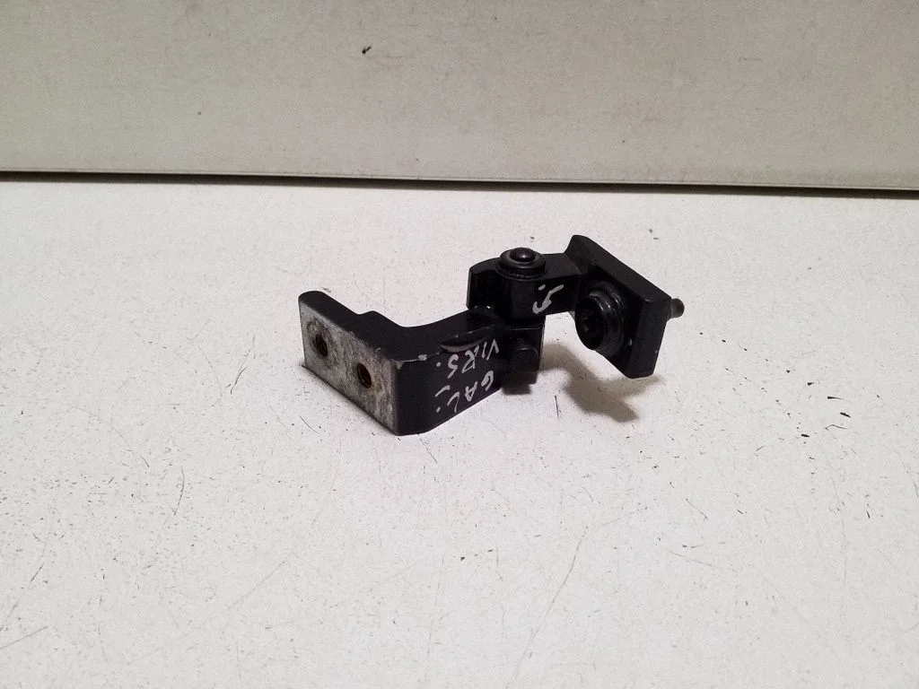 Rear door upper hinge – right