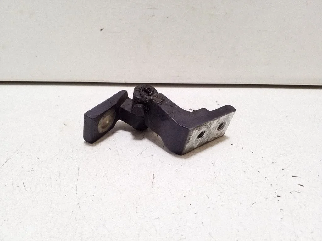 Rear door upper hinge – right