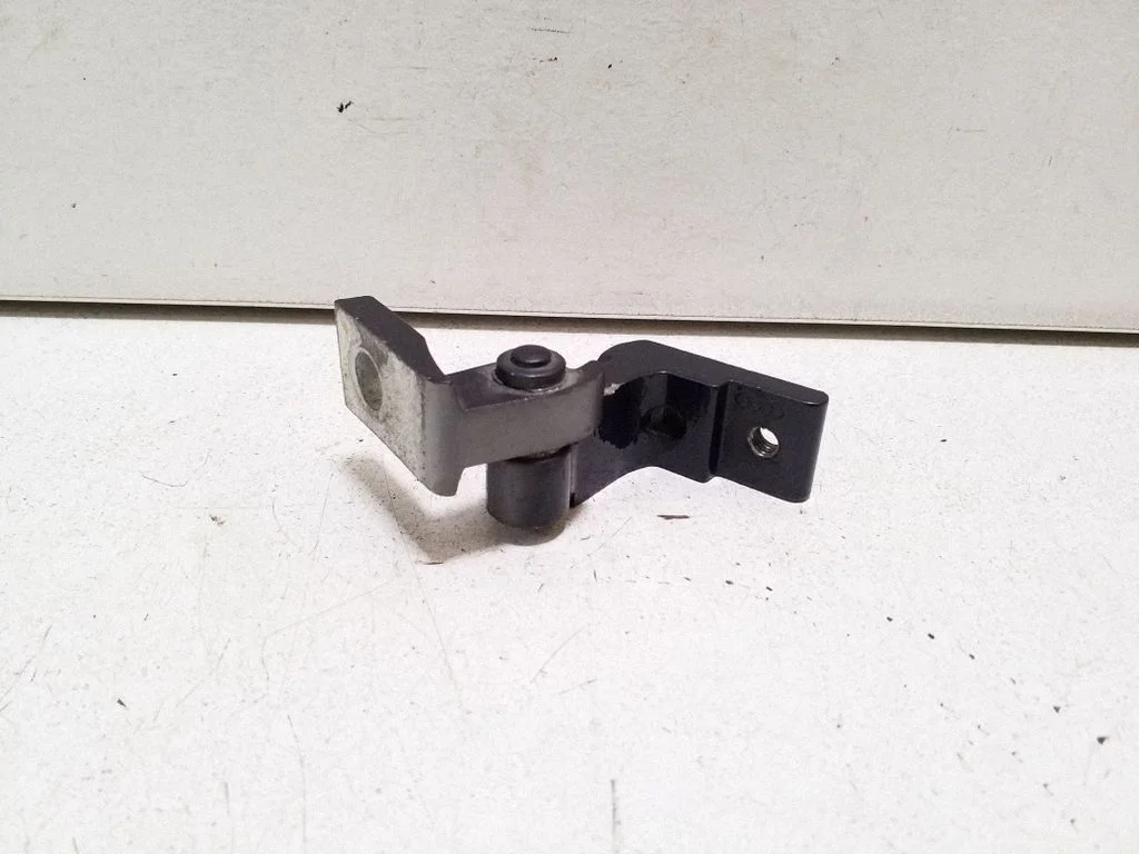 Rear door upper hinge – right