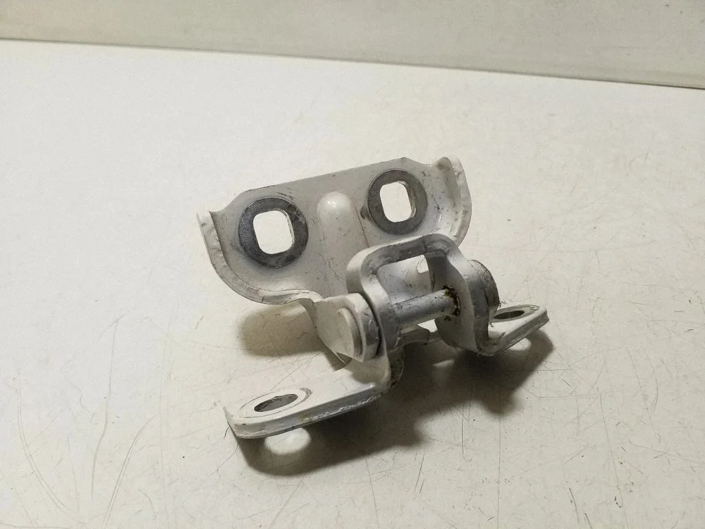 Rear door upper hinge – left