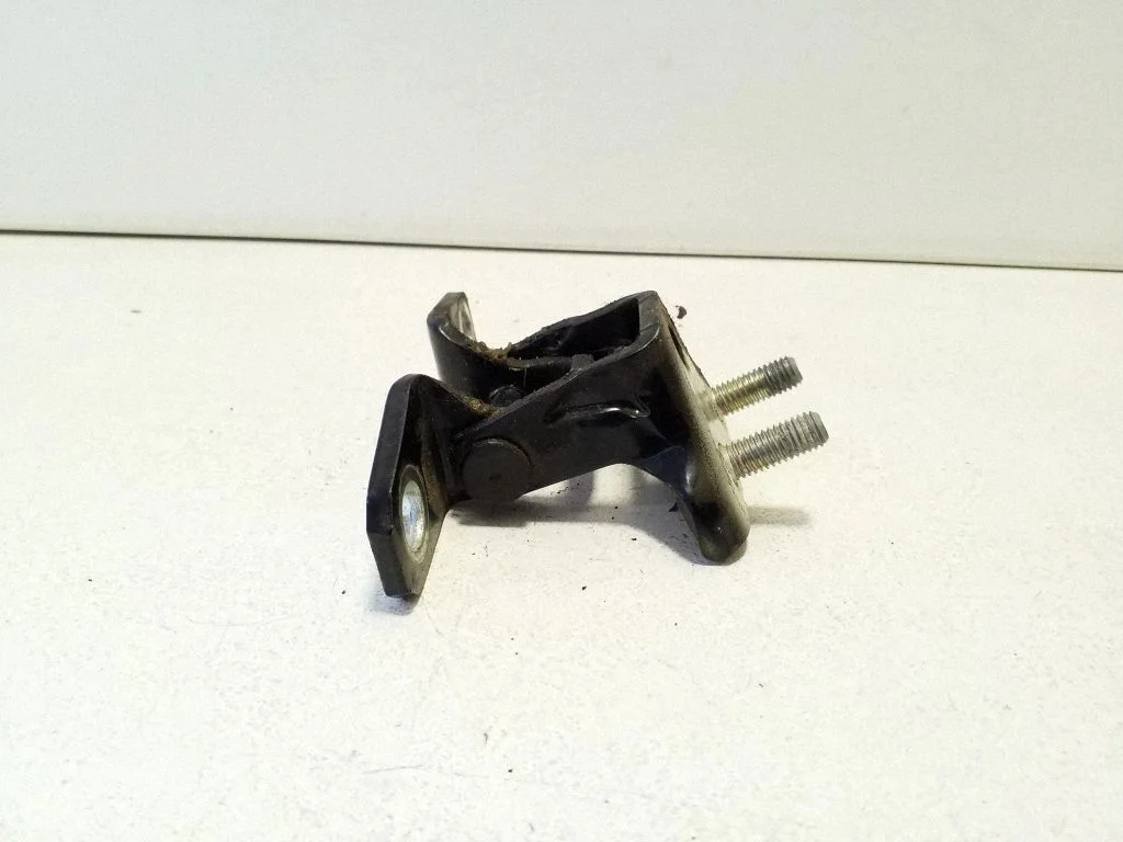 Rear door upper hinge – left