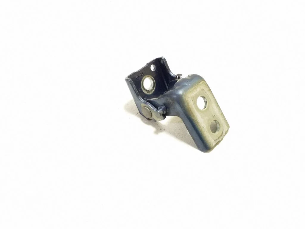Rear door upper hinge – left