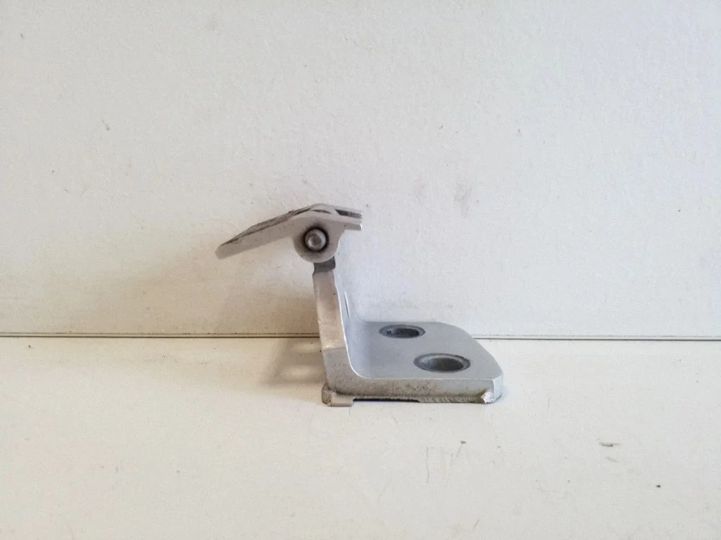 Rear door upper hinge 3402819