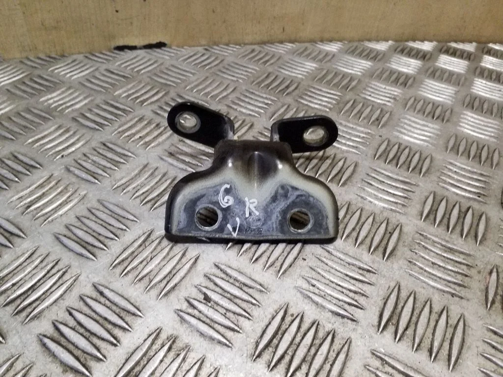 Rear door upper hinge – right