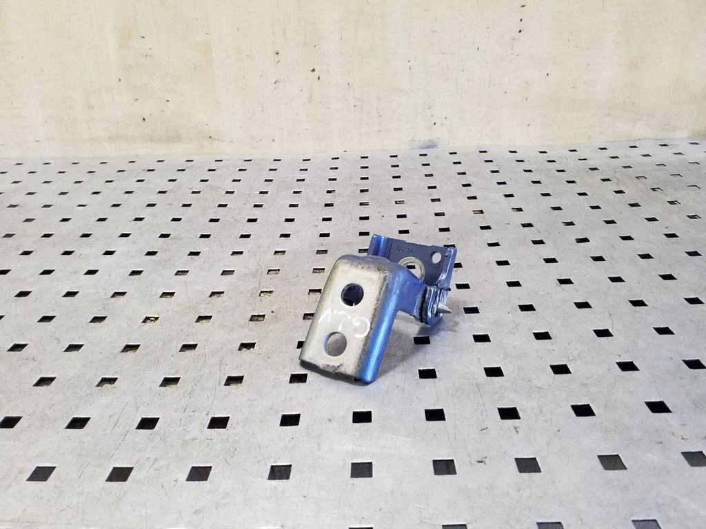Rear door upper hinge – left